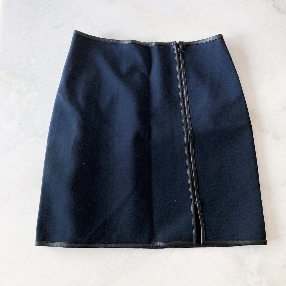 Like new! Club Monaco navy skirt, black piping leather trim side zipper (size 8)